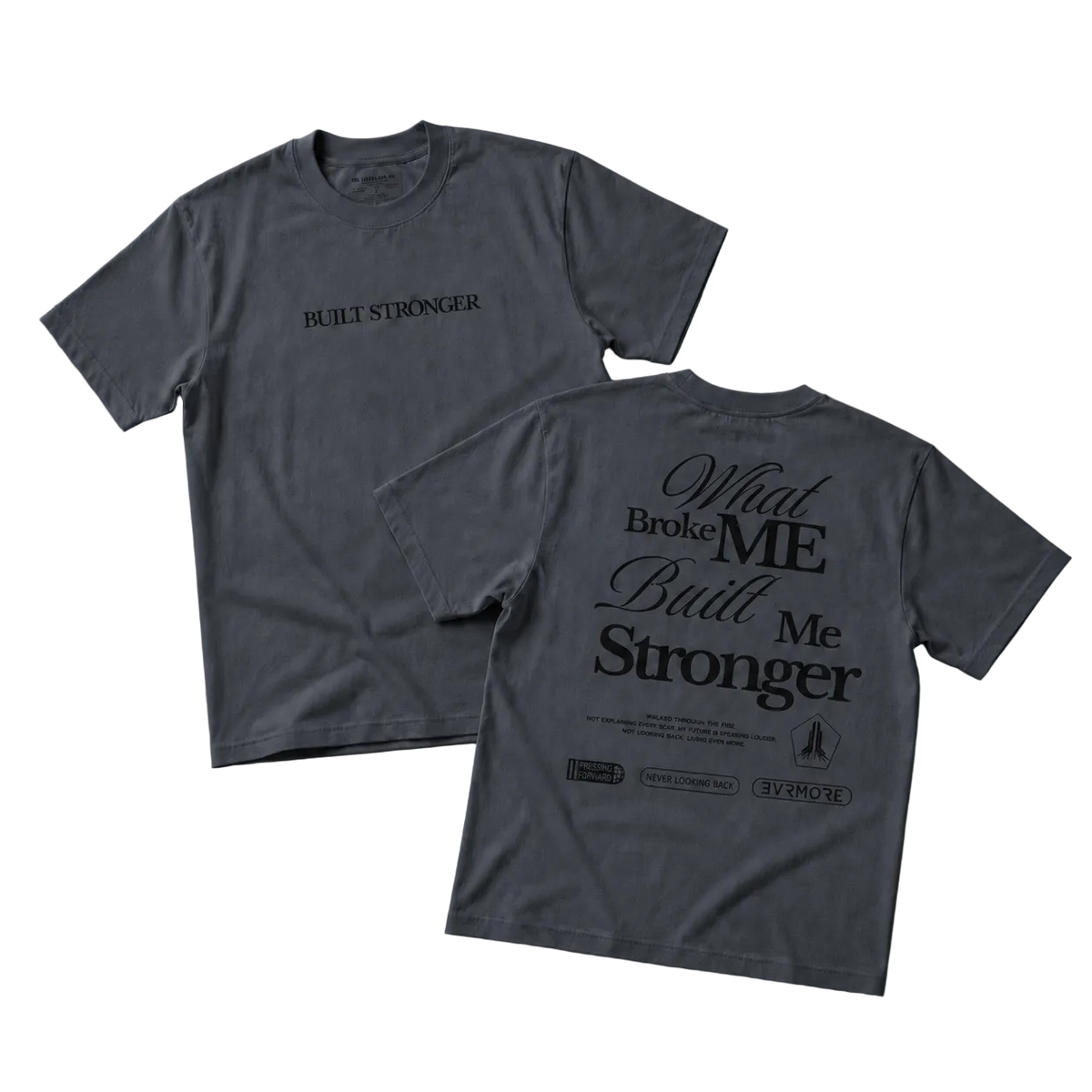 Two views of a dark gray graphic t-shirt on a textured gray background. The front view shows 'BUILT STRONGER' printed in black on the chest, and the back view shows a large black graphic reading 'What Broke Me Built Me Stronger' with smaller text and logos below.